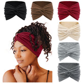 Tobeffect wide headband with front knot offers secure coverage during workouts.