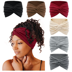 Tobeffect wide headband with front knot offers secure coverage during workouts.