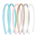 Todder thin glitter headbands six-pack close-up shows sparkling elastic bands for daily wear
