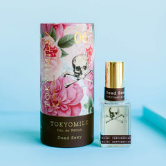 TOKYOMILK Dead Sexy white-orchid image suggests floral lift for daytime confidence.