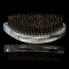 Torino Pro Curve brush in use on waves demonstrates efficient reach across crown.
