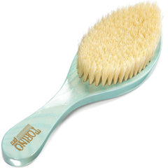 Torino Pro Wave Brush with extra-long boar bristles for thorough distribution.