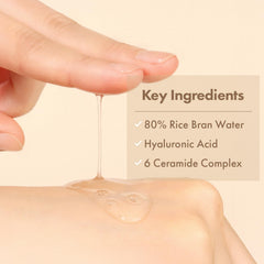 Tosowoong Real Rice Glow Serum dropper pouring demonstrating lightweight hydration for all skin types.