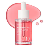 TOSOWOONG Niacinamide serum bottle highlighting 10% niacinamide, tranexamic acid 4%, and arbutin 2% for brightening.