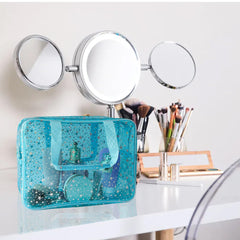 TotePrint light blue makeup bag interior view showing quick item visibility and access