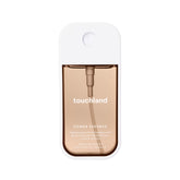 Touchland Vanilla Velvet bottle demonstrates compact travel size for on-the-go refresh.