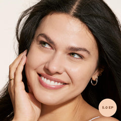 Tower 28 Swipe Serum Concealer being blended for seamless coverage