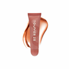 Tower 28 LipSoftie balm-tube close-up highlighting cushiony hydration and smooth glide