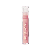 Tower 28 ShineOn Lip Jelly OAT gloss swirl showcases milky pink color and glossy texture for everyday wear