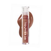 Tower 28 ShineOn Milky Lip Jelly Almond jar shows creamy color with hydrating slip.