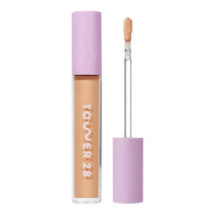Tower 28 Swipe Serum Concealer tube closeup shows hydrating coverage for everyday wear.