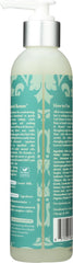 Treluxe Gentle Cleansing Rinse being applied to hair for even cleansing.