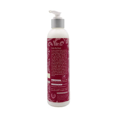 Treluxe Untie The Knot Leave-In Hair Application on lengths for detangling prep