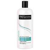 Tresemme anti-breakage conditioner 28oz bottle with strength-boosting formula.