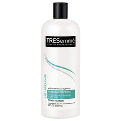 Tresemme anti-breakage conditioner 28oz bottle with strength-boosting formula.