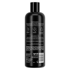 TRESemmé Deep Cleansing Shampoo label closeup highlighting residue-removing formula.