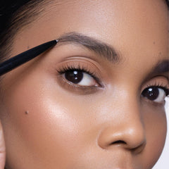 Trish McEvoy brow shaper in compact packaging for quick travel touch-ups.