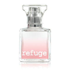 Charlotte Russe Refuge open bottle highlights spray nozzle for easy daily application.