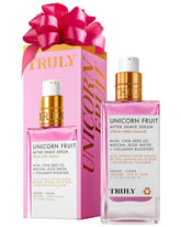 Truly Unicorn Fruit Serum bottle closeup showing fast-absorbing formula for post-shave comfort.
