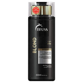 TRUSS Purple Shampoo & Toner bottle pour demonstrates brassy neutralization for brighter blonde tones