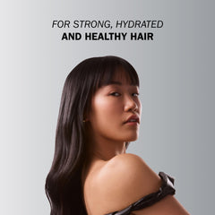 TRUSS Repairing Hair Serum application on damp hair supports detangling and softness.