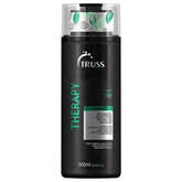 TRUSS Therapy anti-dandruff shampoo bottle highlighting menthol cooling for refreshed scalp