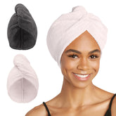 Turbie Twist two-pack microfiber towel in grey and pink for quick, gentle drying.