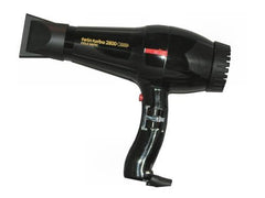 Turbo Power Twinturbo 2800 Coldmatic Hair Dryer in-use demonstrates ergonomic handheld design.