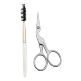 Tweezerman brow shaping scissors close-up shows precise trimming for clean brows