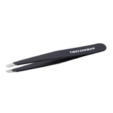 Tweezerman G.E.A.R. Slant Tweezer Midnight closeup highlights precise hand-filed tips for accurate hair removal.