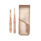 Tweezerman rose gold petite point tweezers—precise brow shaping for clean lines.