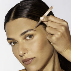 Tweezerman rose-gold tweezer grip provides comfortable control for precise hair removal.