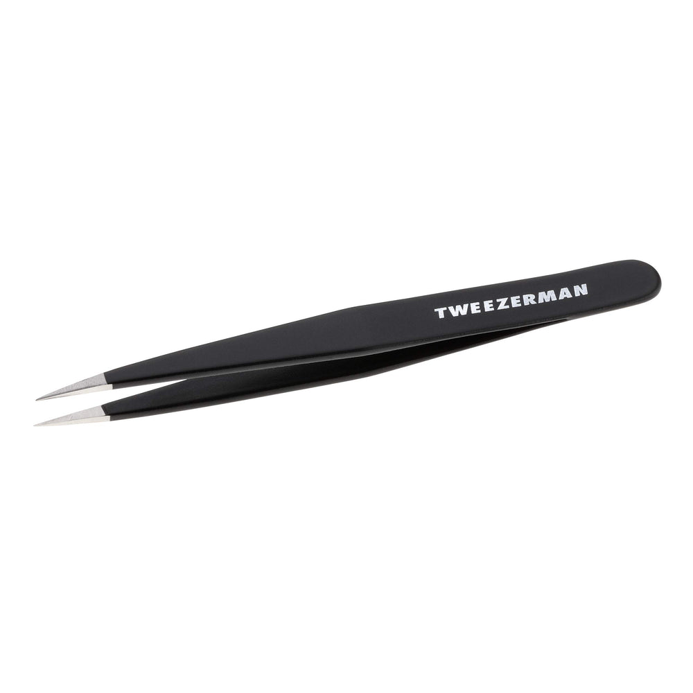 Tweezerman stainless steel point tweezer closeup for precise hair removal