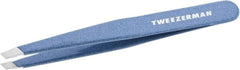 Tweezerman stainless steel slant tweezer close-up showing precision tips for brow shaping