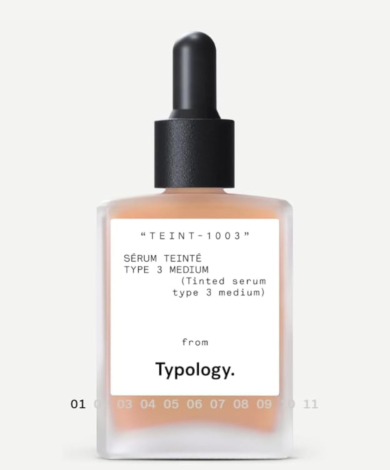 Typology tinted serum bottle close-up promoting radiant skin with vegan formula.