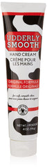 Udderly Smooth hand cream application close-up shows quick absorption and softening skin.