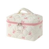 uekeboag large travel quilted makeup bag with floral pattern keeps cosmetics organized on trips.
