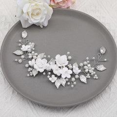 Unicra pearls and rhinestones detail shows delicate craftsmanship for elegant wedding styling.