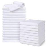 UNIMADE salon towels 24-pack white towels stacked for quick-drying in salons.
