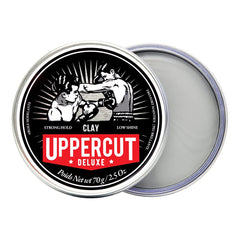 Uppercut Deluxe Clay hands applying product demonstrates reworkable hold while styling.