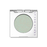Urban Decay 24/7 Lucid teal shimmer transformer swatch showing long-lasting color payoff