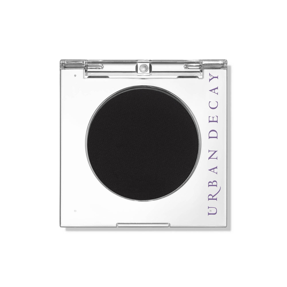 Urban Decay 24/7 Eyeshadow Blackout compact with velvet matte finish for crease-free wear.