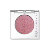 URBAN DECAY Bad Seed warm pink shimmer compact delivers crease-free color with high pigment.