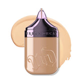 URBAN DECAY Face Bond bottle with pump showing self-setting formula for long wear