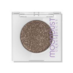 Urban Decay Moondust glitter close-up showing micro-glitter for luminous lids.