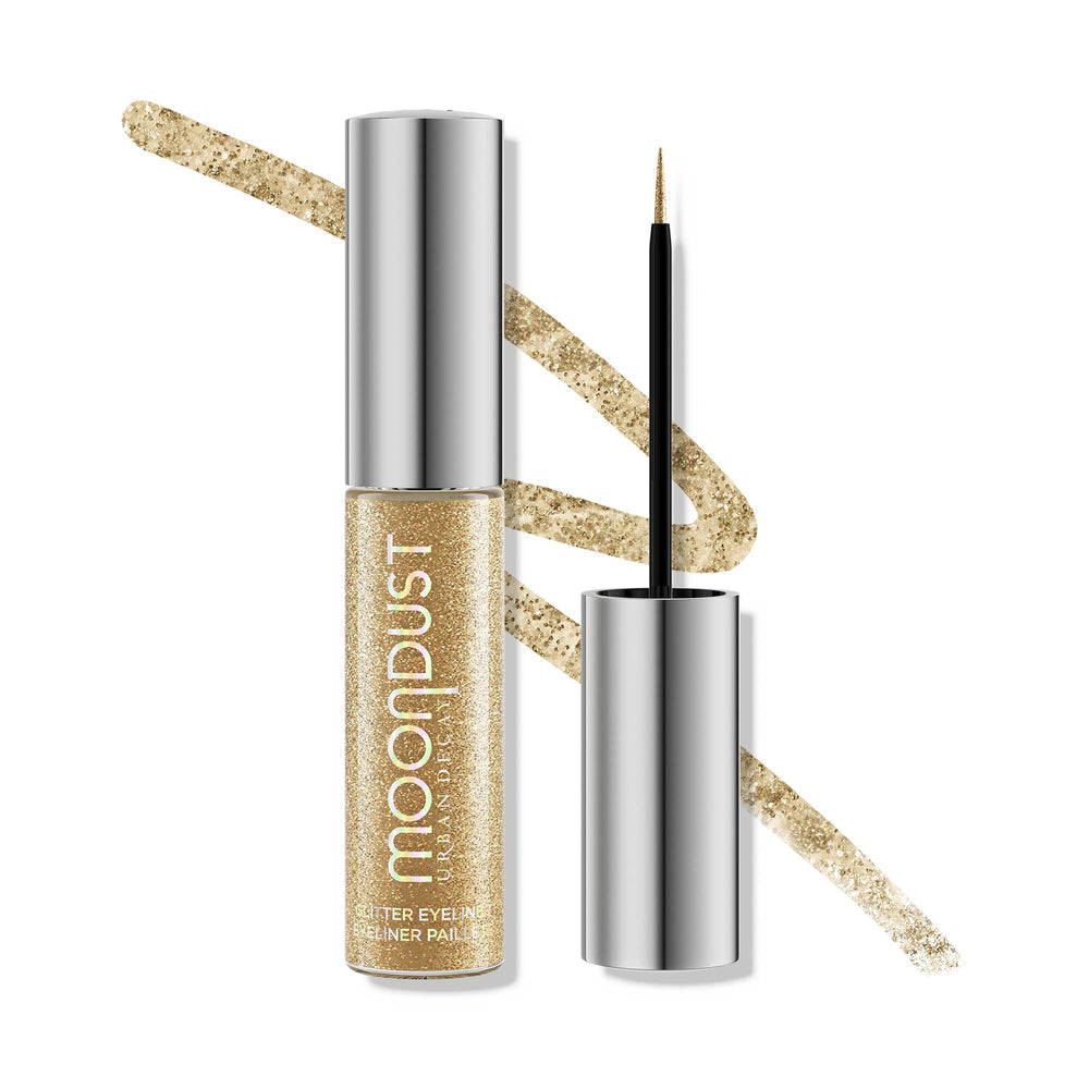Urban Decay Moondust Liquid Eyeliner Midnight Cowboy bottle with gold glitter for long-wear shimmer.