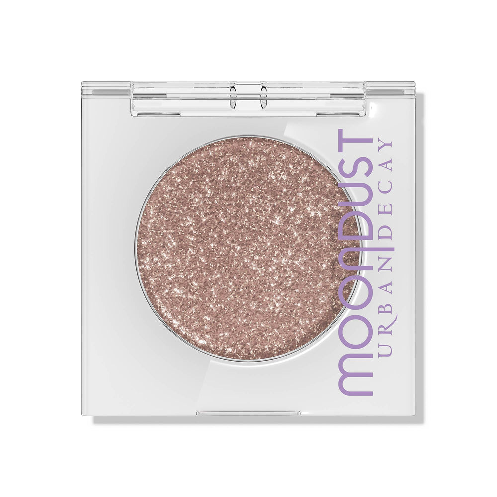 Urban Decay Moondust Space Cowboy swatch reveals champagne gold sparkle for light-catching glow