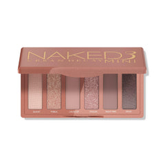 Urban Decay Naked3 Mini palette open compact showcasing versatile rosy neutrals for day-to-night looks