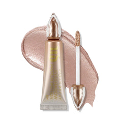 Urban Decay Shimmer Eyeshadow Primer Potion Sin bottle with champagne shimmer for crease-free color