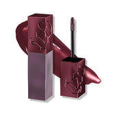 Urban Decay Vice Lip Bond Give Em Backtalk close-up shows glossy, long-wear nude-mauve lip.
